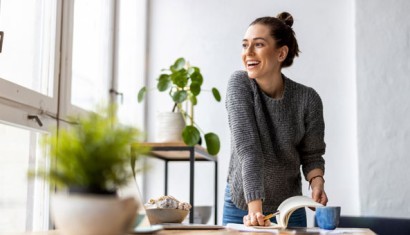 woman in office looking out the window