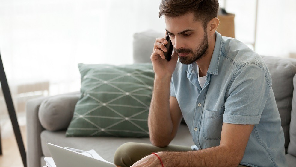 Man on phone at home BANNER