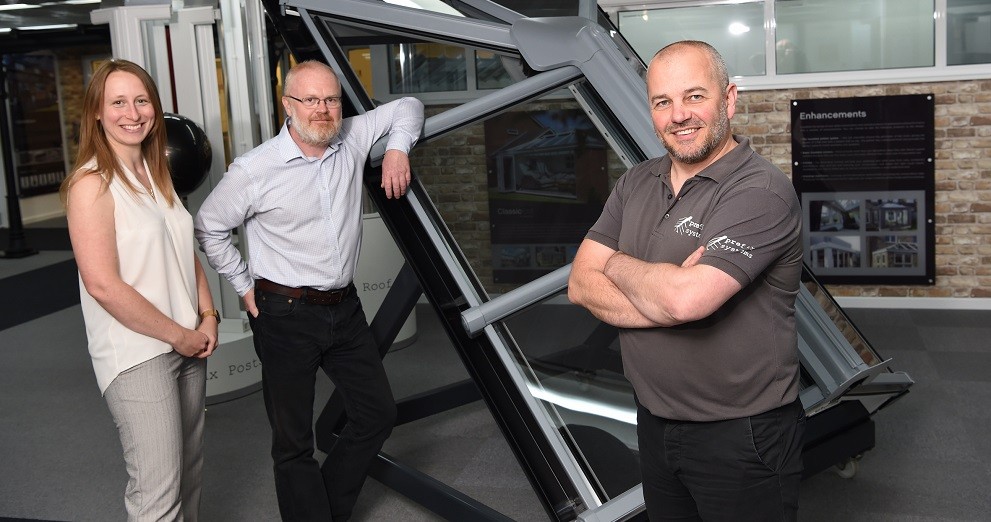 Prefix Systems team with loft window